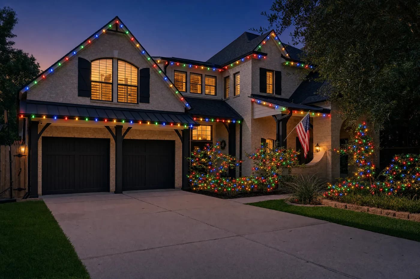 Warm-white Christmas light installation on a white estate among the pines in The Woodlands TX